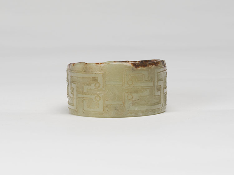 A Chinese Celadon and Russet Tubular Jade Ornament, Possibly Neolithic with Later Carving par  Chinese Art