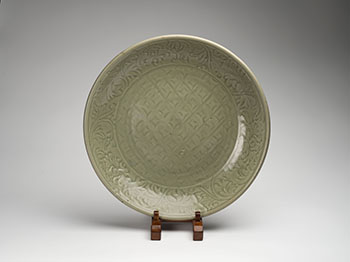 A Large Chinese Longquan Celadon Glazed Charger, Ming Dynasty, 15th Century by  Chinese Art sold for $31,250
