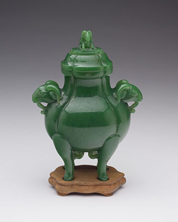 A Chinese Spinach Green Jade 'Rams Head' Vase and Cover, Qing Dynasty by Chinese Artist