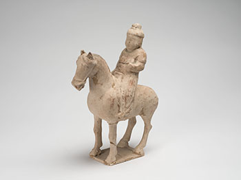 A Chinese Buff Earthenware Model of an Equestrian Figure, Tang Dynasty (618-907 CE) par  Chinese Art