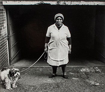 Housekeeper on Dog Walk, Hillbrow, June 1972 by David Goldblatt