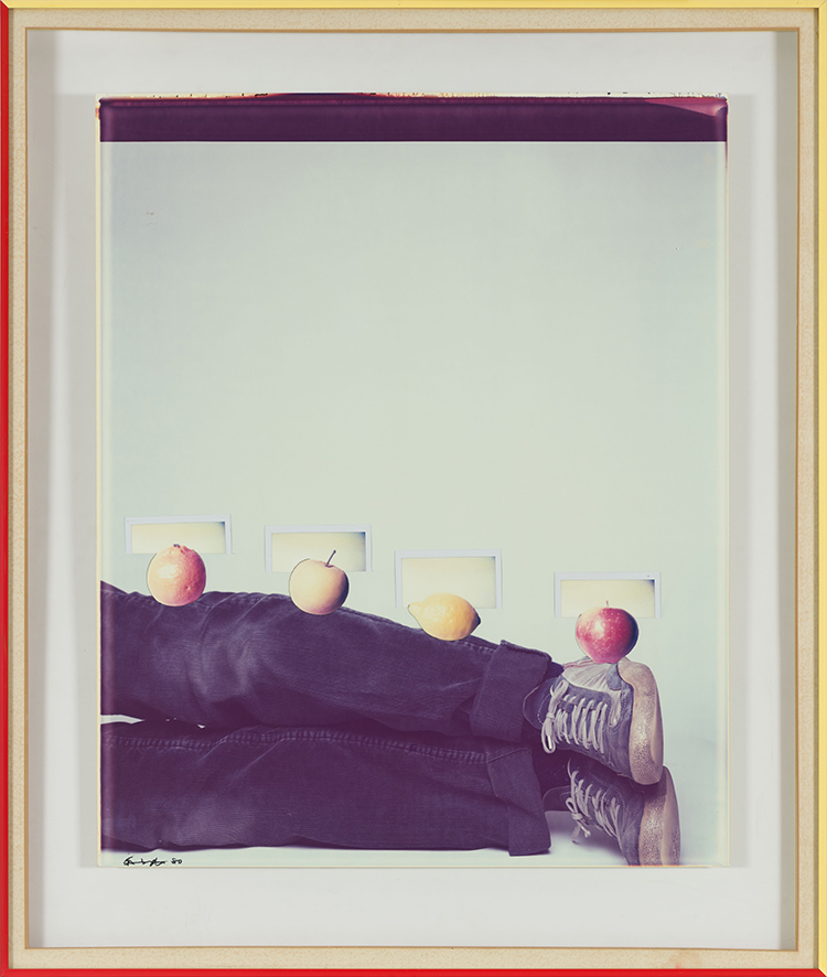 Still life - legs, 3 plastic fruits and 1 real fruit par Iain Baxter