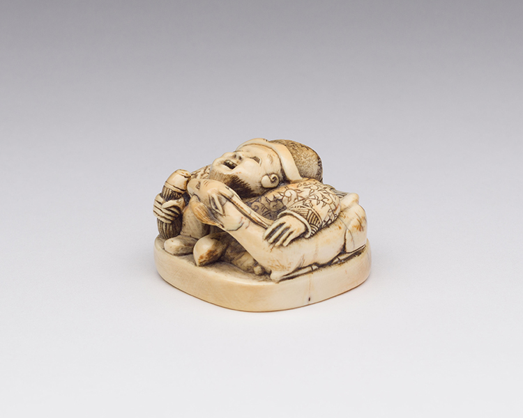 An Unusual Japanese Ivory Seal-Form Chinese Man and Mythical Beast, 19th Century by  Japanese Art