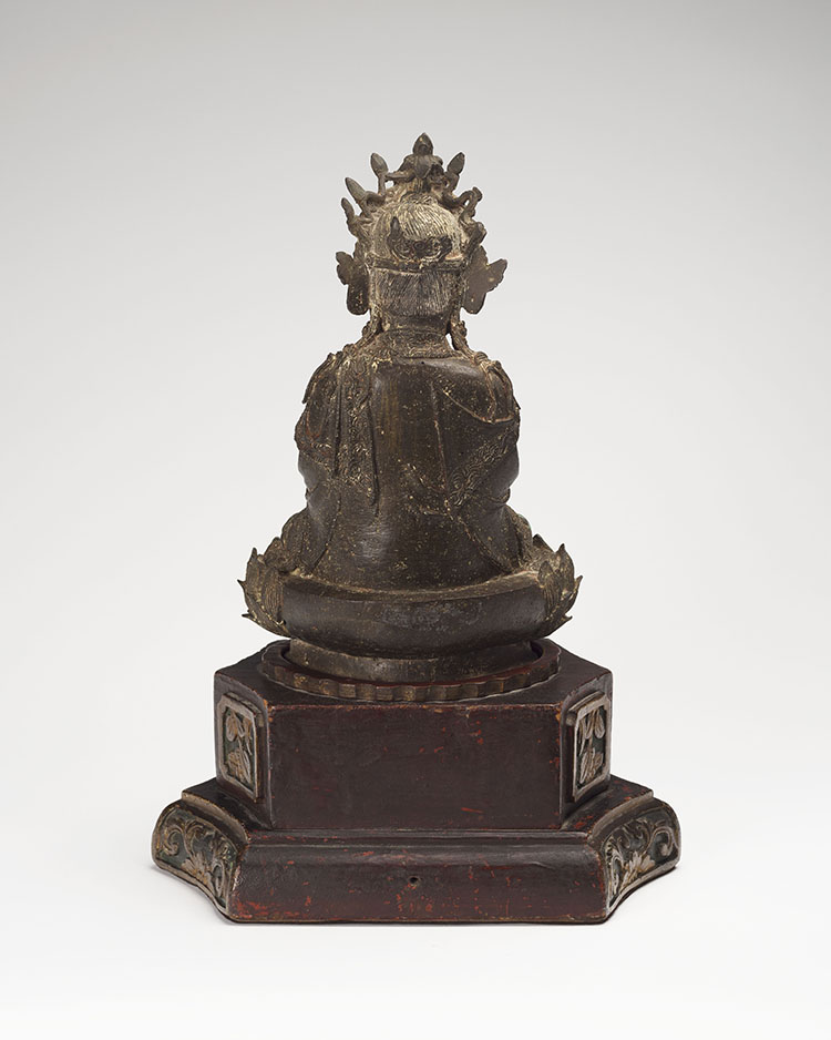 A Chinese Bronze Seated Figure of a Crowned Buddha, Ming Dynasty, 16th/17th Century by  Chinese Art