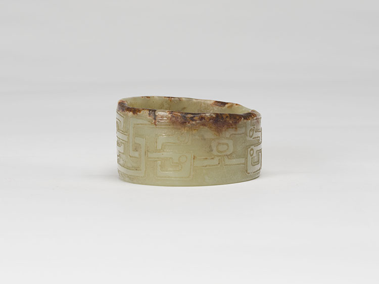 A Chinese Celadon and Russet Tubular Jade Ornament, Possibly Neolithic with Later Carving by  Chinese Art